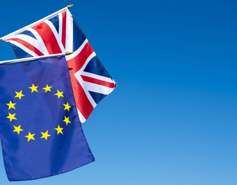 European Union and British Union Jack flag flying in front of bright blue sky for the Brexit EU referendum result; Shutterstock ID 491578537; Purchase Order: 20190425; Job: Brexit Checklist; Client/Licensee: Robert Claus/Saskia Kötzle